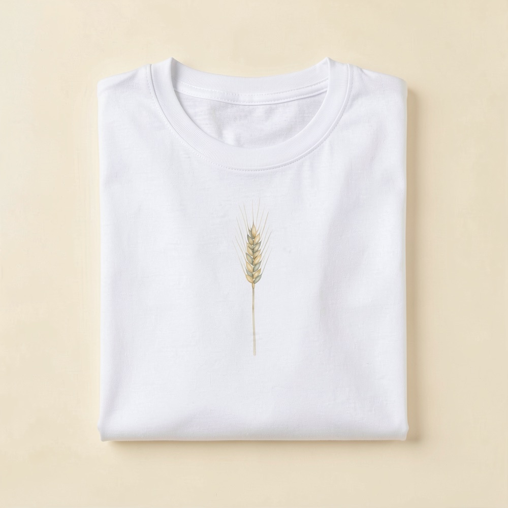 Folded natural-white t-shirt with a watercolour wheat stalk printed on the chest